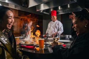 a chef cooking food in a restaurant