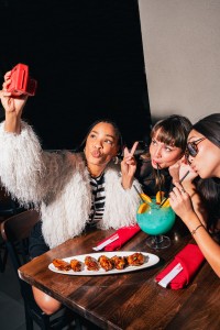 a group of women taking a selfie